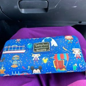 Disney parks colorful Loungefly It’s a small world with zipper closure